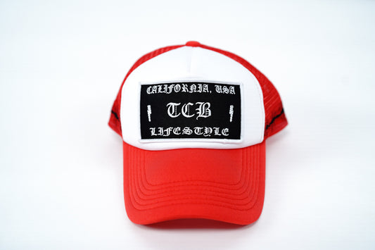 RED BARBED FOAM TRUCKER HAT